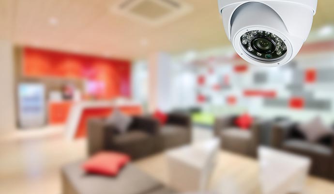 home cctv security camera on blur background