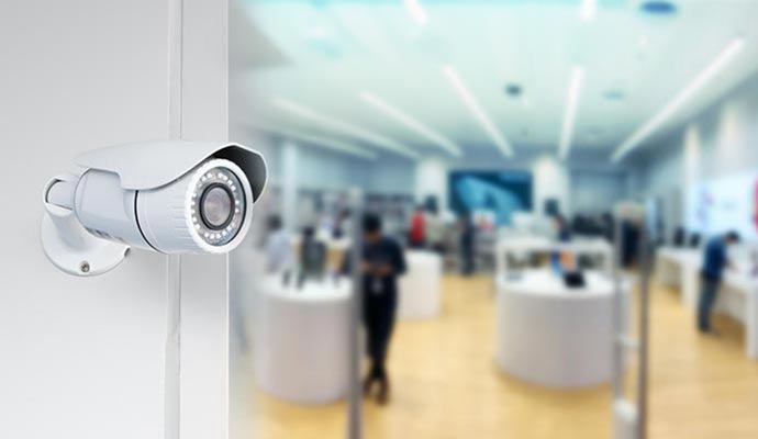 installed security camera on a store
